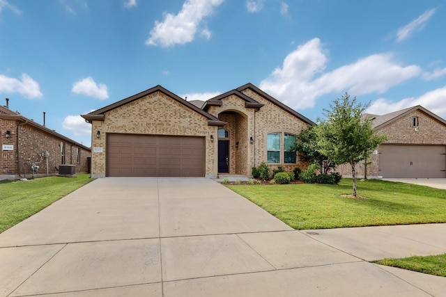 9133 Copper Crossing Dr, Fort Worth, TX 76131 - view of front of house with driveway, a garage, a front yard, and brick siding