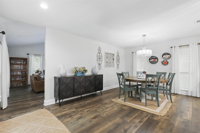 824 Wheelwood Dr, Hurst, TX 76053 - dining area with an inviting chandelier, dark wood-style flooring, and baseboards