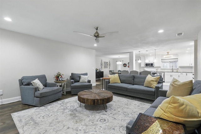 824 Wheelwood Dr, Hurst, TX 76053 - living room featuring visible vents, recessed lighting, dark wood finished floors, a ceiling fan, and baseboards