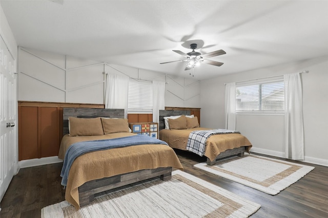 824 Wheelwood Dr, Hurst, TX 76053 - bedroom with baseboards, a ceiling fan, and wood finished floors