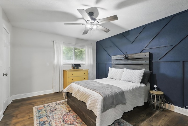 824 Wheelwood Dr, Hurst, TX 76053 - bedroom with ceiling fan, baseboards, and wood finished floors
