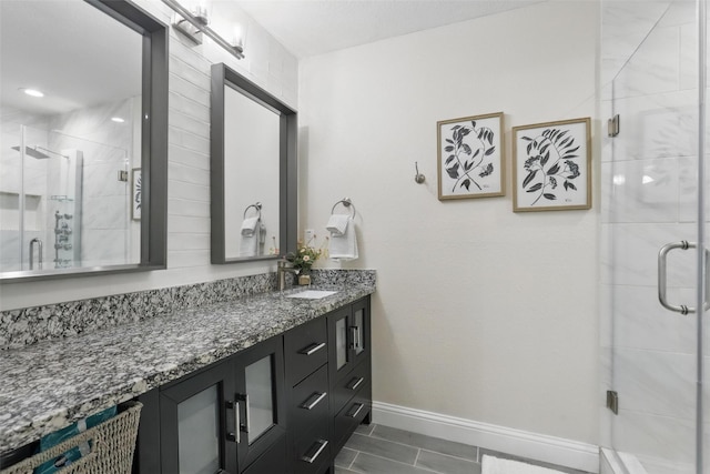 824 Wheelwood Dr, Hurst, TX 76053 - full bath with vanity, baseboards, and a shower stall