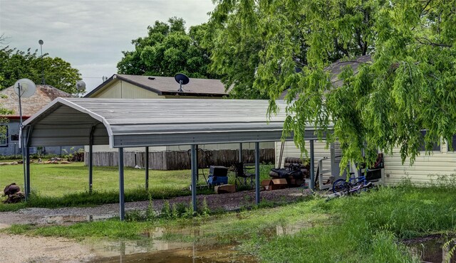 307 W Front St, Sunset, TX 76270 - view of parking featuring fence