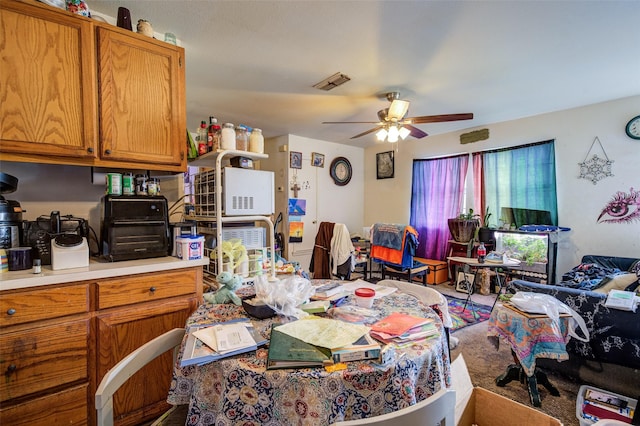 307 W Front St, Sunset, TX 76270 - dining space with visible vents and ceiling fan