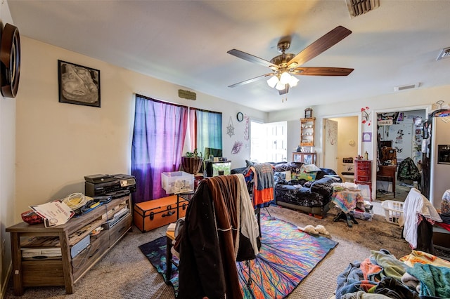 307 W Front St, Sunset, TX 76270 - carpeted bedroom with ceiling fan and visible vents
