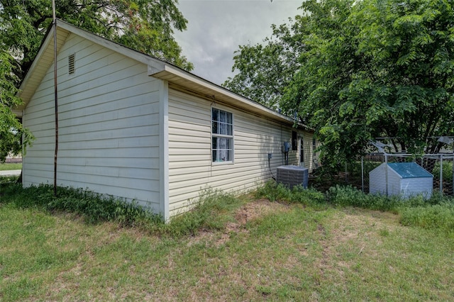 307 W Front St, Sunset, TX 76270 - view of side of home featuring a yard and central air condition unit