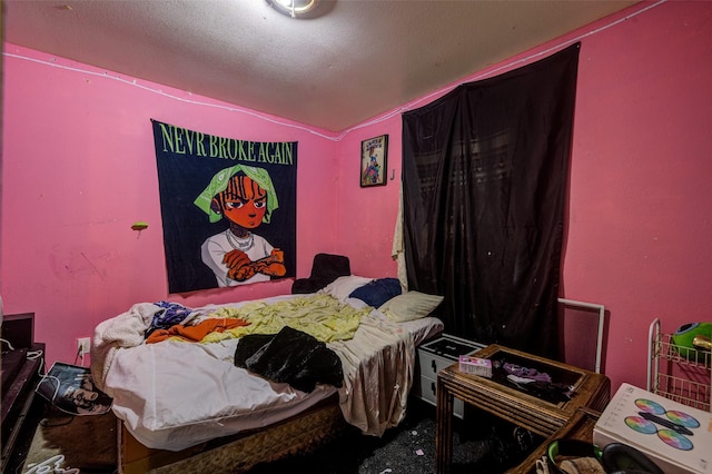 307 W Front St, Sunset, TX 76270 - bedroom featuring carpet flooring and vaulted ceiling