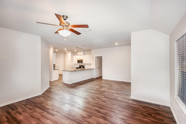 4605 Ashmark Rd, Little Elm, TX 76227 - unfurnished living room featuring a ceiling fan, baseboards, recessed lighting, and dark wood-style floors