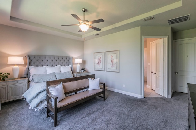 bedroom featuring carpet flooring, baseboards, and visible vents