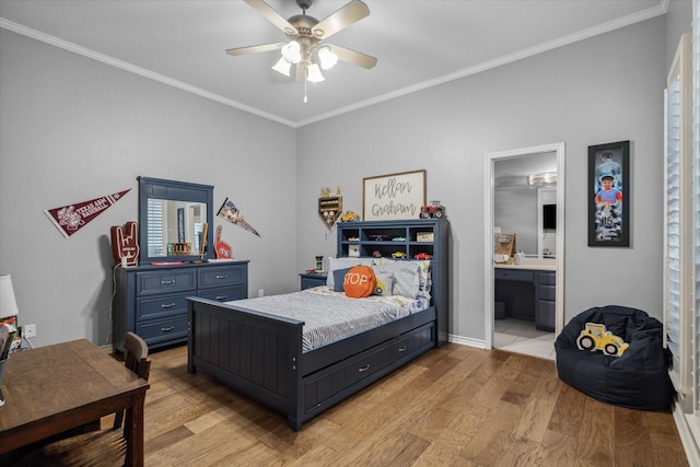bedroom with connected bathroom, light wood-style floors, a ceiling fan, and ornamental molding