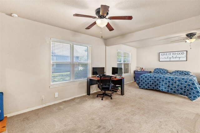 bedroom featuring carpet flooring, baseboards, and a ceiling fan