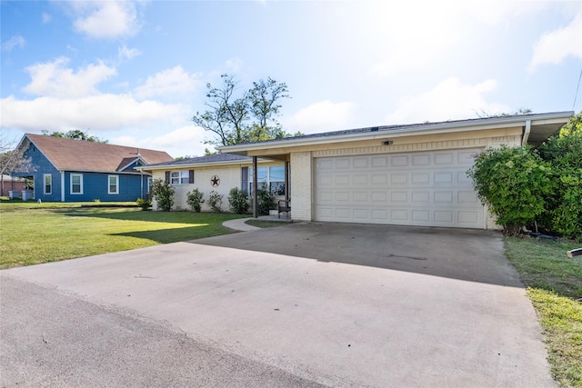single story home featuring concrete driveway, a garage, brick siding, and a front yard