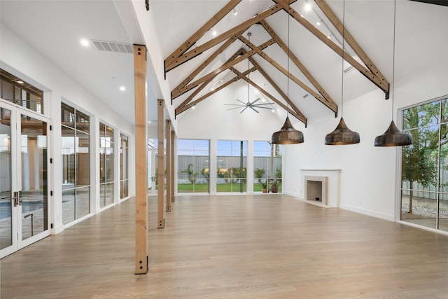 5747 Charlestown Dr, Dallas, TX 75230 - unfurnished living room featuring light wood-style flooring, high vaulted ceiling, visible vents, and beam ceiling
