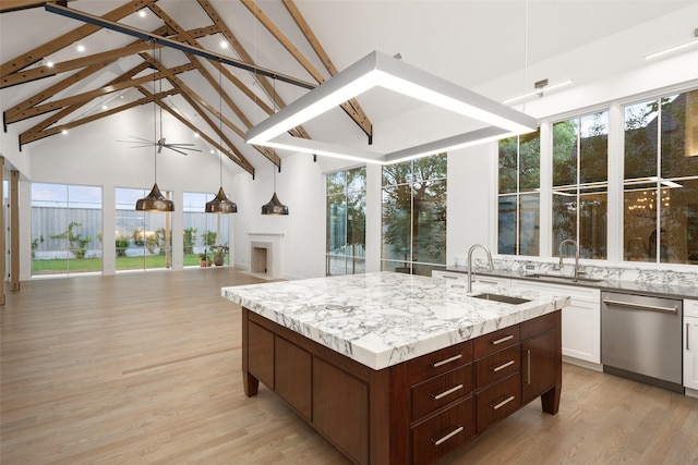 5747 Charlestown Dr, Dallas, TX 75230 - interior space featuring a sink, beamed ceiling, and plenty of natural light