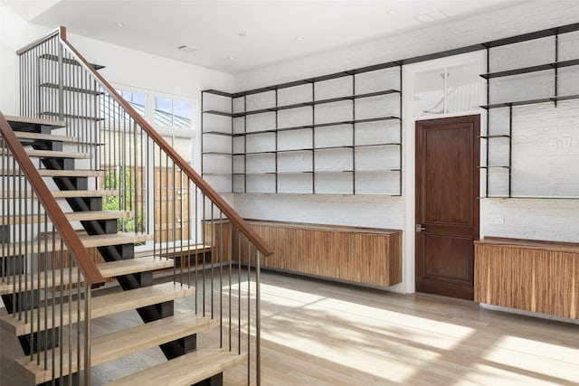 5747 Charlestown Dr, Dallas, TX 75230 - stairs featuring wood finished floors