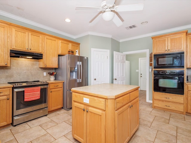 kitchen with black appliances, under cabinet range hood, crown molding, light countertops, and decorative backsplash