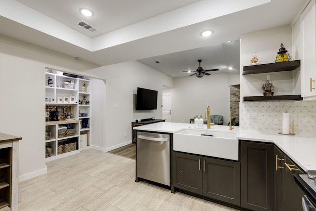 kitchen with dishwasher, visible vents, a sink, a peninsula, and open shelves