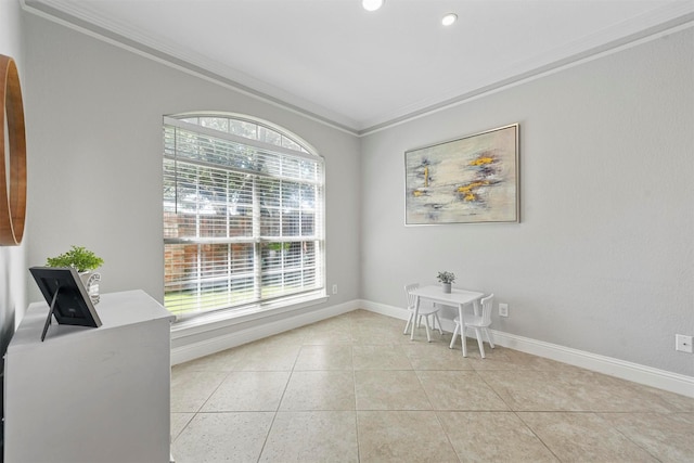 dining room featuring crown molding, baseboards, light tile patterned flooring, and recessed lighting