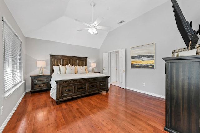 bedroom with ceiling fan, visible vents, baseboards, and wood-type flooring