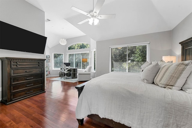 bedroom featuring baseboards, visible vents, ceiling fan with notable chandelier, vaulted ceiling, and dark wood-style floors