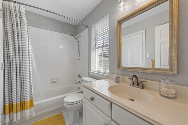 bathroom featuring shower / tub combo with curtain, vanity, and toilet