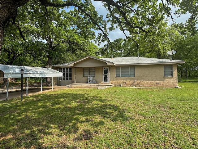 406 Mockingbird Ln, Chico, TX 76431 - ranch-style house with crawl space, brick siding, a front lawn, and a carport