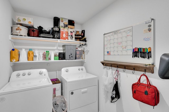 washroom featuring independent washer and dryer and laundry area