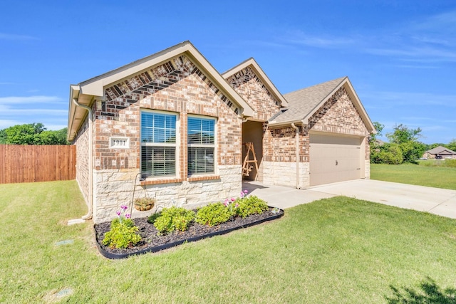 view of front of home with an attached garage, concrete driveway, fence, and stone siding