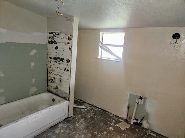 bathroom featuring a textured ceiling