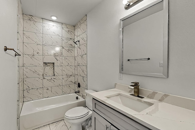503 W Martin Luther King St, Denison, TX 75020 - full bathroom with toilet, marble finish floor, vanity, and shower / washtub combination