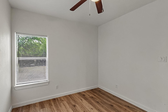 503 W Martin Luther King St, Denison, TX 75020 - unfurnished room featuring baseboards, ceiling fan, and wood finished floors