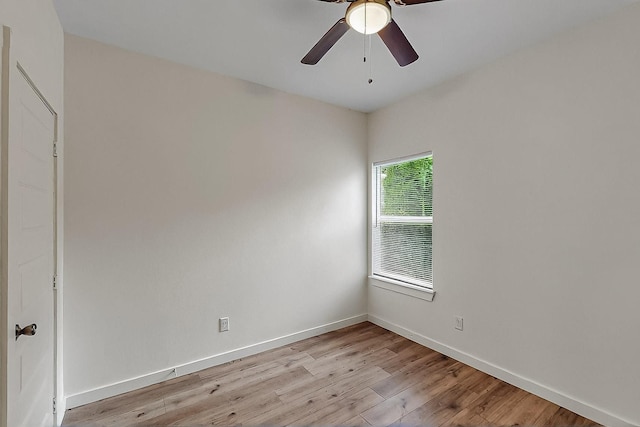 503 W Martin Luther King St, Denison, TX 75020 - unfurnished room featuring baseboards, light wood finished floors, and ceiling fan