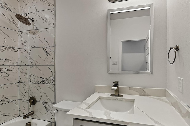 503 W Martin Luther King St, Denison, TX 75020 - bathroom with toilet, shower / bathing tub combination, and vanity