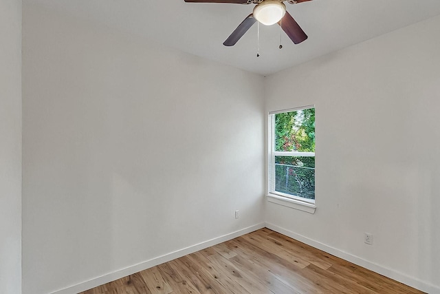 503 W Martin Luther King St, Denison, TX 75020 - spare room featuring ceiling fan, light wood-style flooring, and baseboards