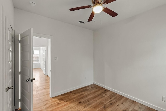 503 W Martin Luther King St, Denison, TX 75020 - unfurnished room featuring a ceiling fan, baseboards, light wood-type flooring, and visible vents