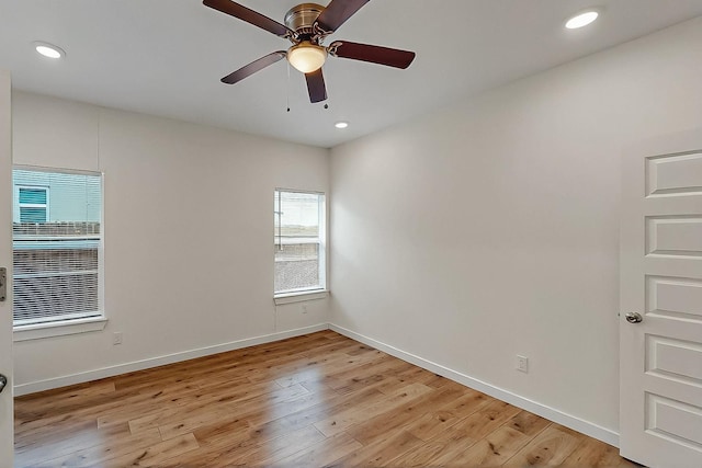503 W Martin Luther King St, Denison, TX 75020 - unfurnished room with baseboards, a ceiling fan, and light wood-style floors
