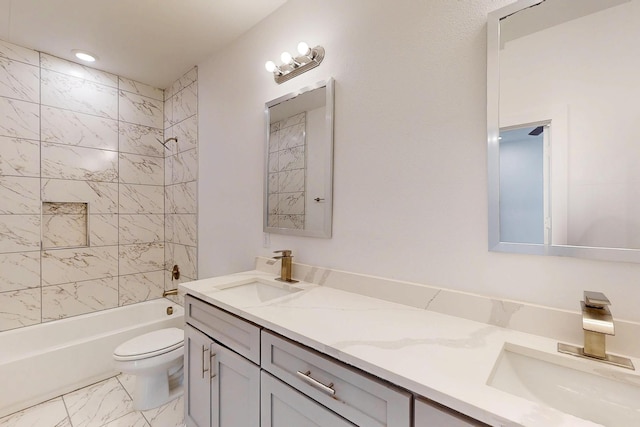 503 W Martin Luther King St, Denison, TX 75020 - bathroom with double vanity, toilet, shower / washtub combination, and a sink