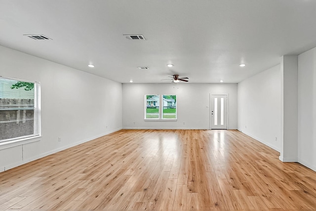 503 W Martin Luther King St, Denison, TX 75020 - unfurnished room featuring light wood-type flooring, visible vents, a ceiling fan, and recessed lighting