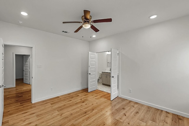 503 W Martin Luther King St, Denison, TX 75020 - unfurnished bedroom featuring light wood finished floors, baseboards, visible vents, and recessed lighting