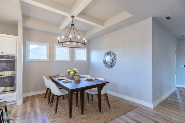 3342 Torrey Pne, Abilene, TX 79606 - dining room with an inviting chandelier, a wealth of natural light, visible vents, and light wood-style flooring