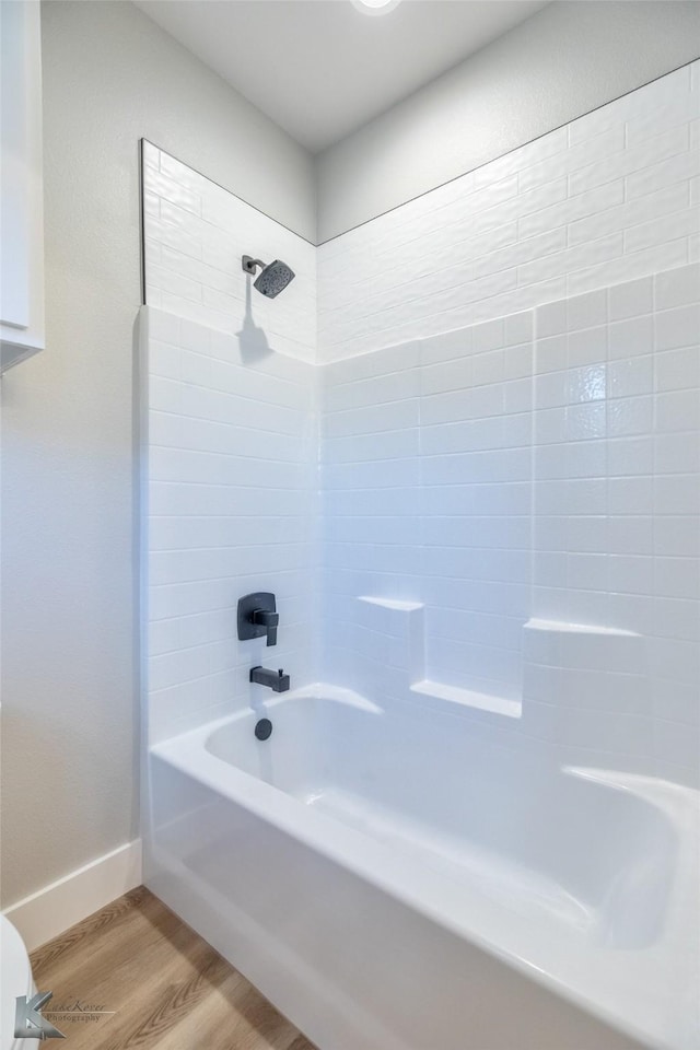 3342 Torrey Pne, Abilene, TX 79606 - full bathroom with tub / shower combination, baseboards, and wood finished floors