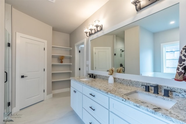 3342 Torrey Pne, Abilene, TX 79606 - bathroom with a stall shower, double vanity, and a sink