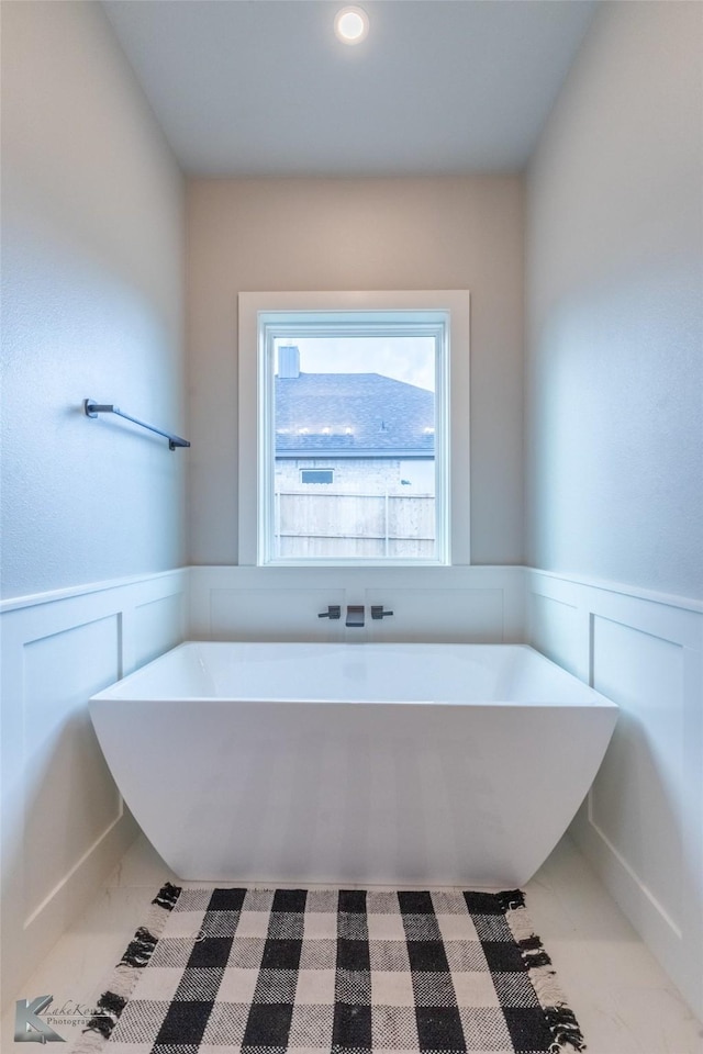 3342 Torrey Pne, Abilene, TX 79606 - full bath featuring wainscoting, a decorative wall, and marble finish floor