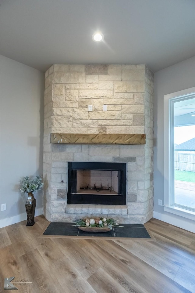 3342 Torrey Pne, Abilene, TX 79606 - room details with wood finished floors, a fireplace, and baseboards