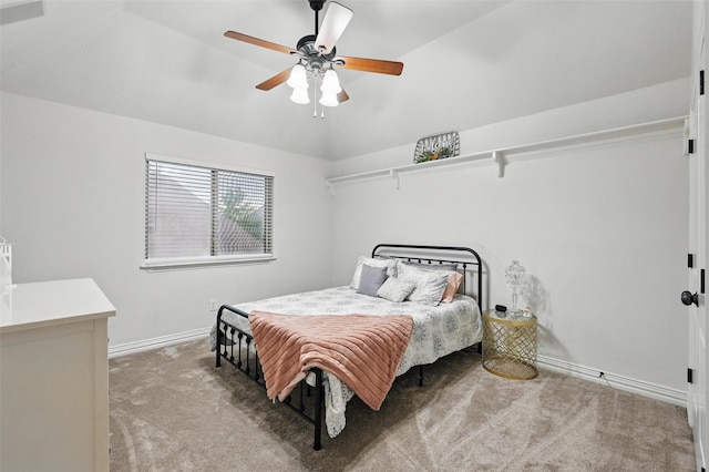 bedroom featuring ceiling fan, carpet floors, and baseboards