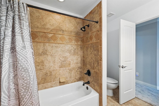 bathroom with toilet, baseboards, shower / bath combo with shower curtain, and visible vents