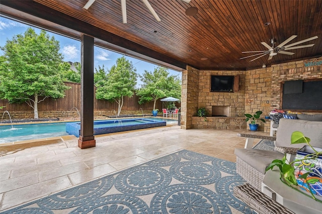 view of patio with a fenced backyard, an outdoor living space with a fireplace, a fenced in pool, and a ceiling fan