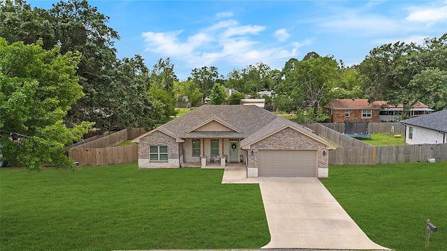 ranch-style home featuring driveway, brick siding, an attached garage, fence private yard, and a front lawn
