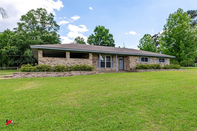 1020 Machen Dr, Springhill, LA 71075 - single story home featuring brick siding and a front lawn