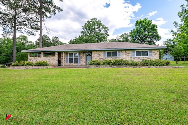 1020 Machen Dr, Springhill, LA 71075 - ranch-style home with a front yard and brick siding